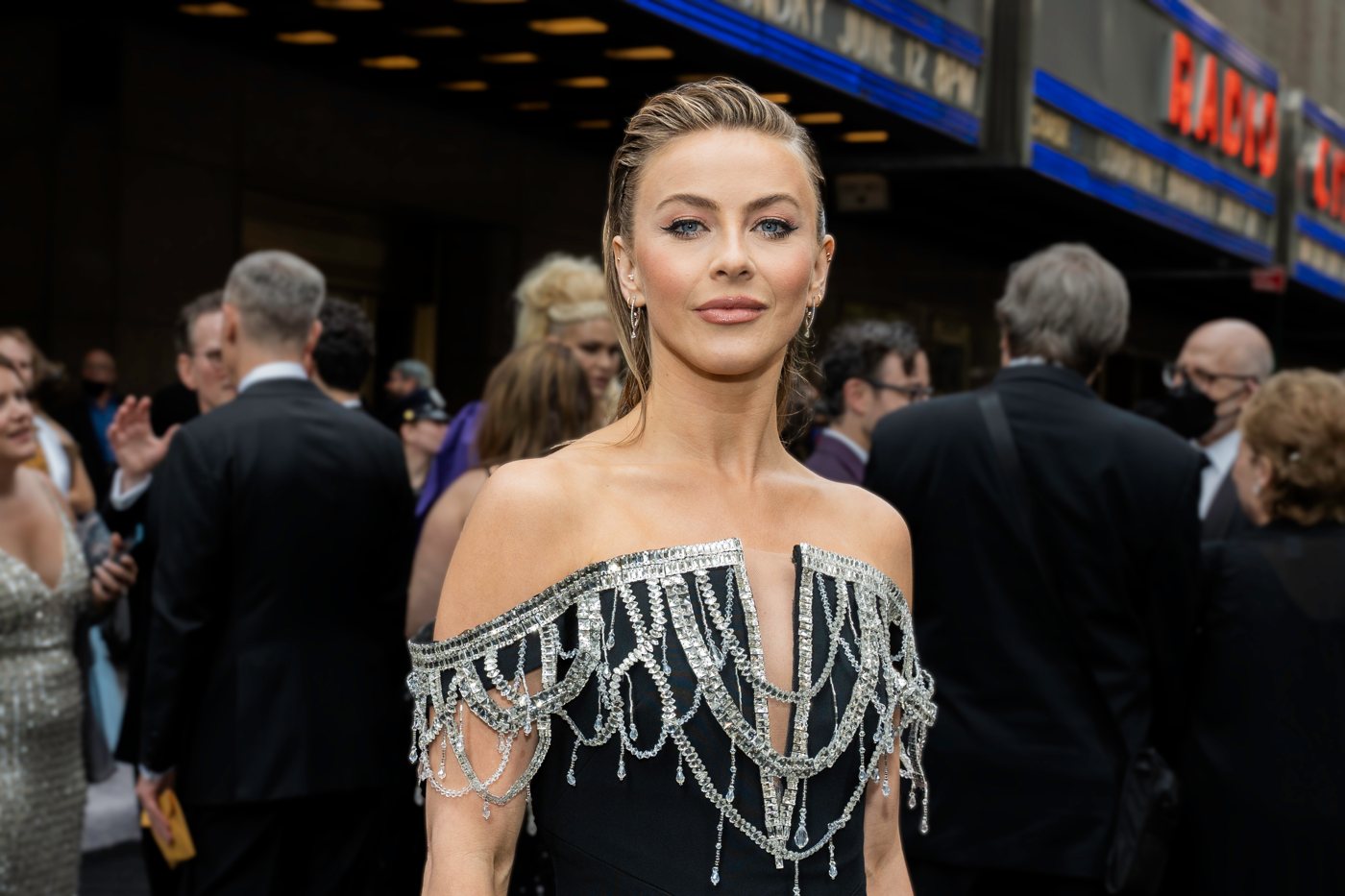 Red carpet portrait in a jeweled black gown at the Tony Awards